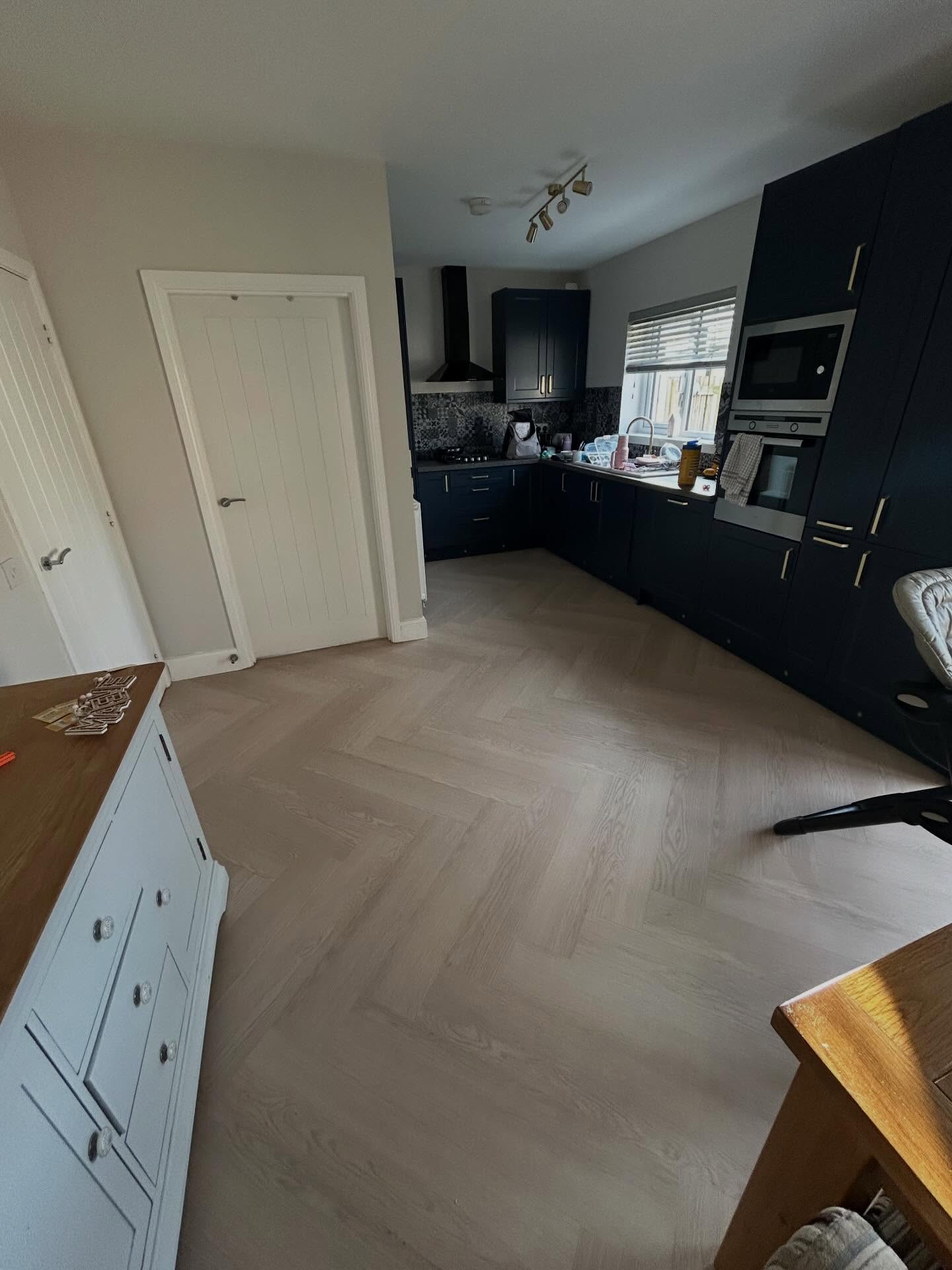 Challenging continuous herringbone floor installation