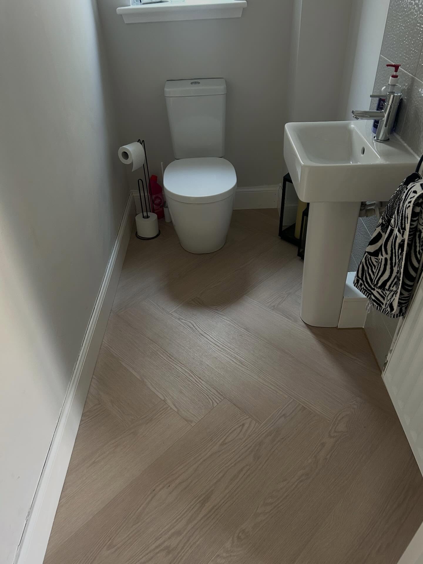 Precision herringbone pattern alignment throughout home